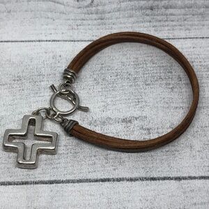 Artisan made leather and sterling silver charm bracelet